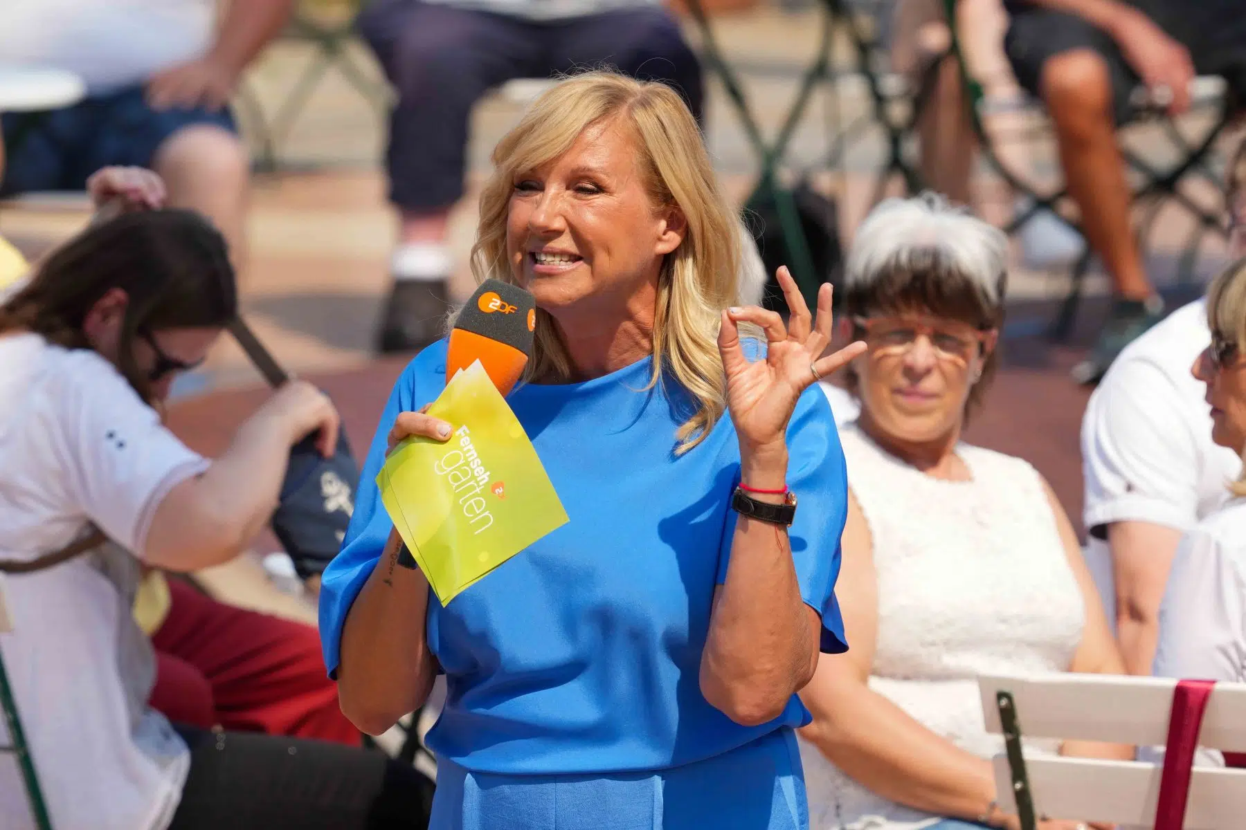 Moderatorin Andrea Kiwi Kiewel in der Unterhaltungsshow ZDF Fernsehgarten am 12.05.2024 in Mainz. Moderatorin Andrea Kiwi Kiewel in der Unterhaltungsshow ZDF Fernsehgarten am 12.05.2024 in Mainz.